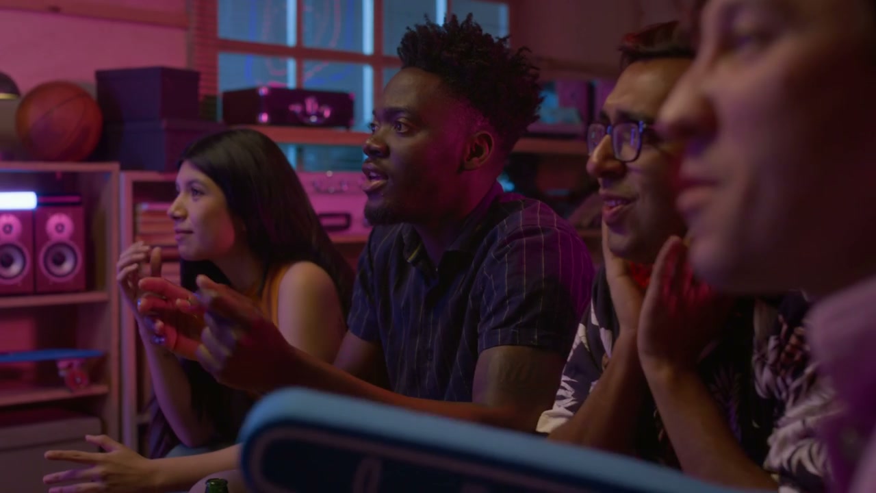 Excited Friends Watching Sports Game