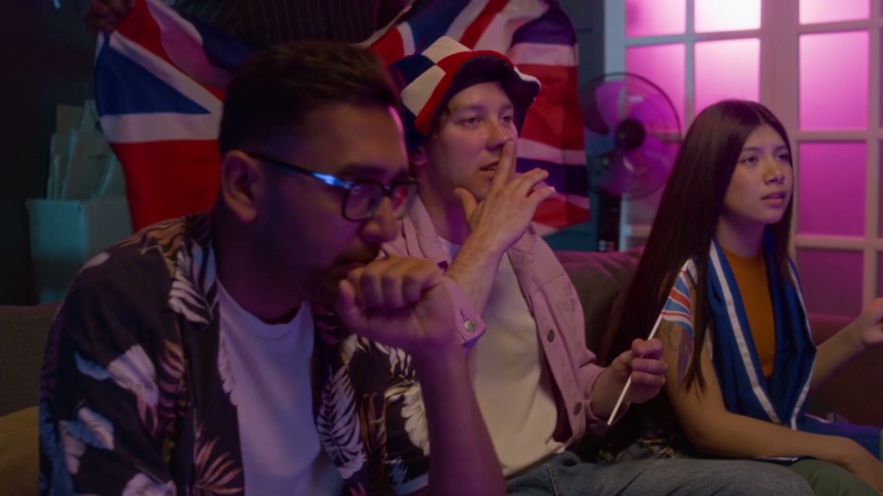 Disappointed UK Sports Fans Watching Game