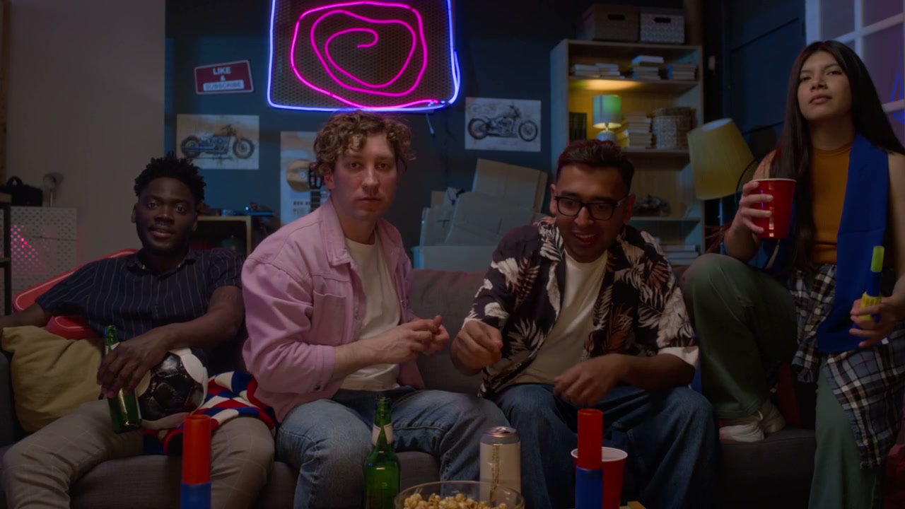 Friends Watching Sports Match at Home