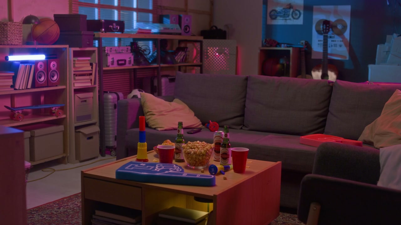 Neon Lit Game Room With Snacks and Drinks