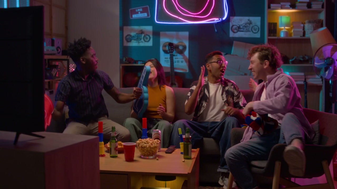 Multiethnic Friends Watching Sports and Celebrating