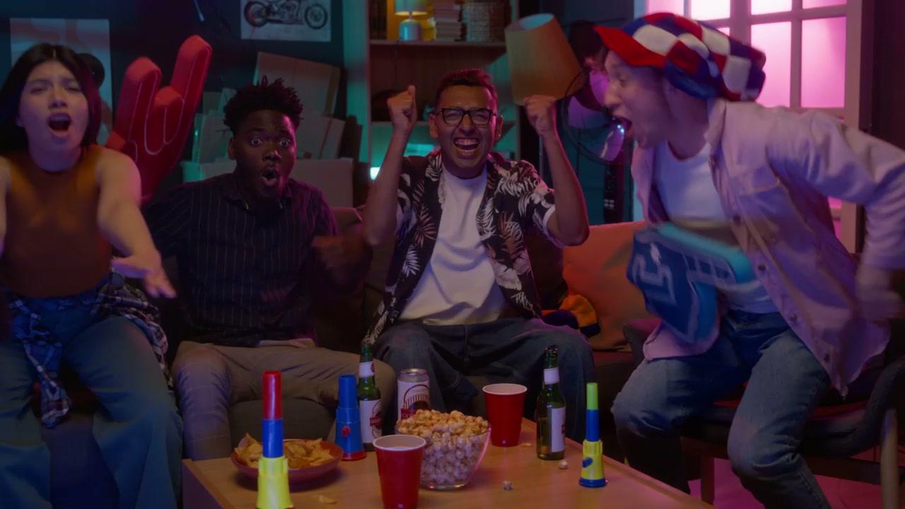 Diverse Friends Cheering at Sports Watch Party