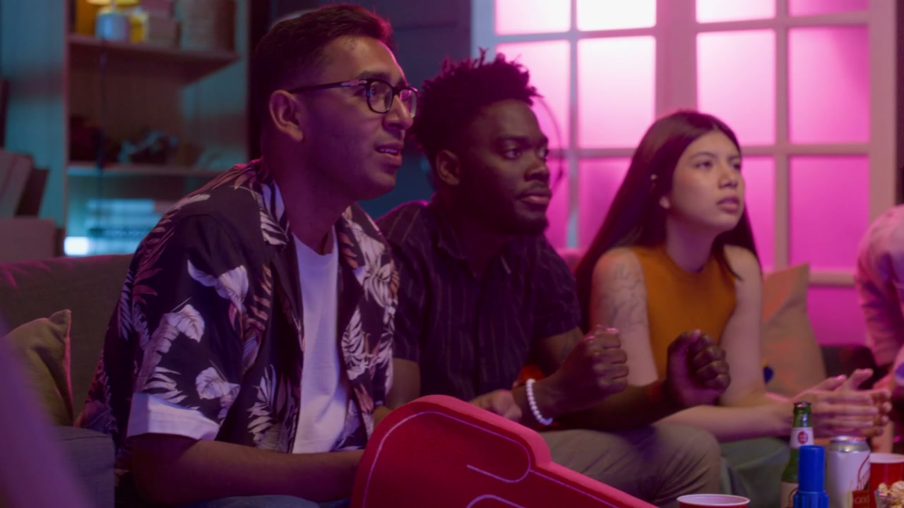 Excited Friends Watching Sports Game