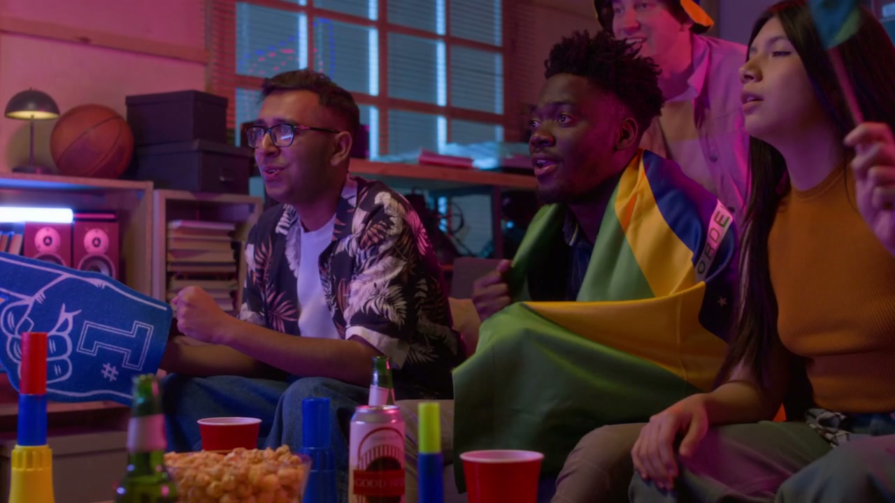 Excited Friends Watching Sports Game