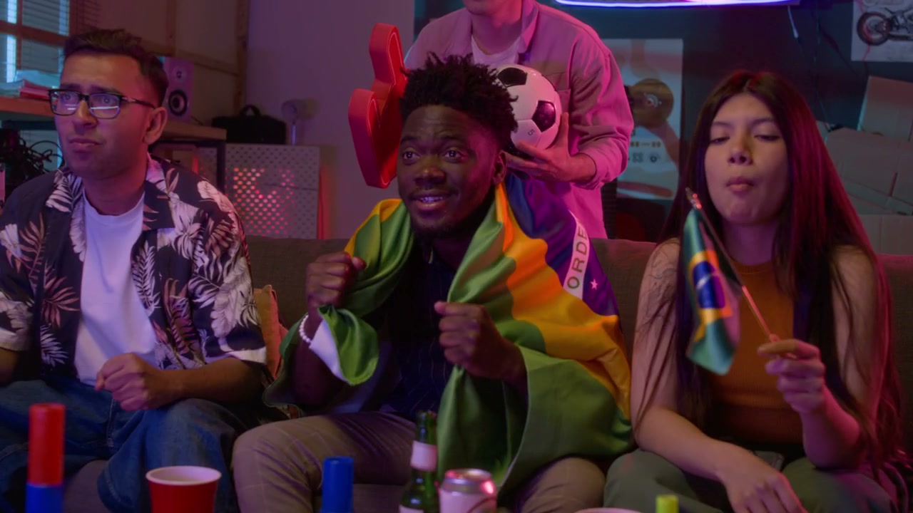 Brazilian Football Fans Cheering On Sofa