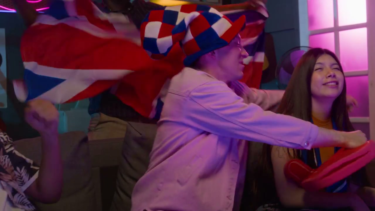 Excited British Sports Fans Watching Game