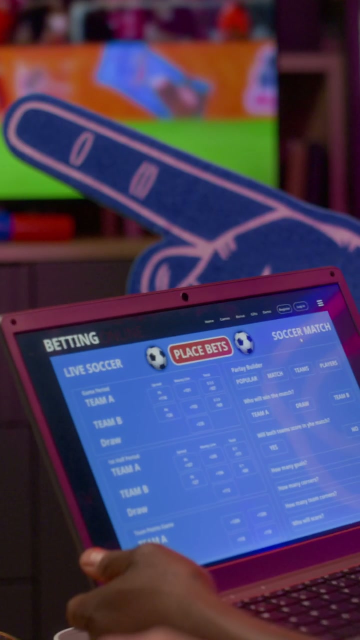 Close-up of Laptop with Live Soccer Bets