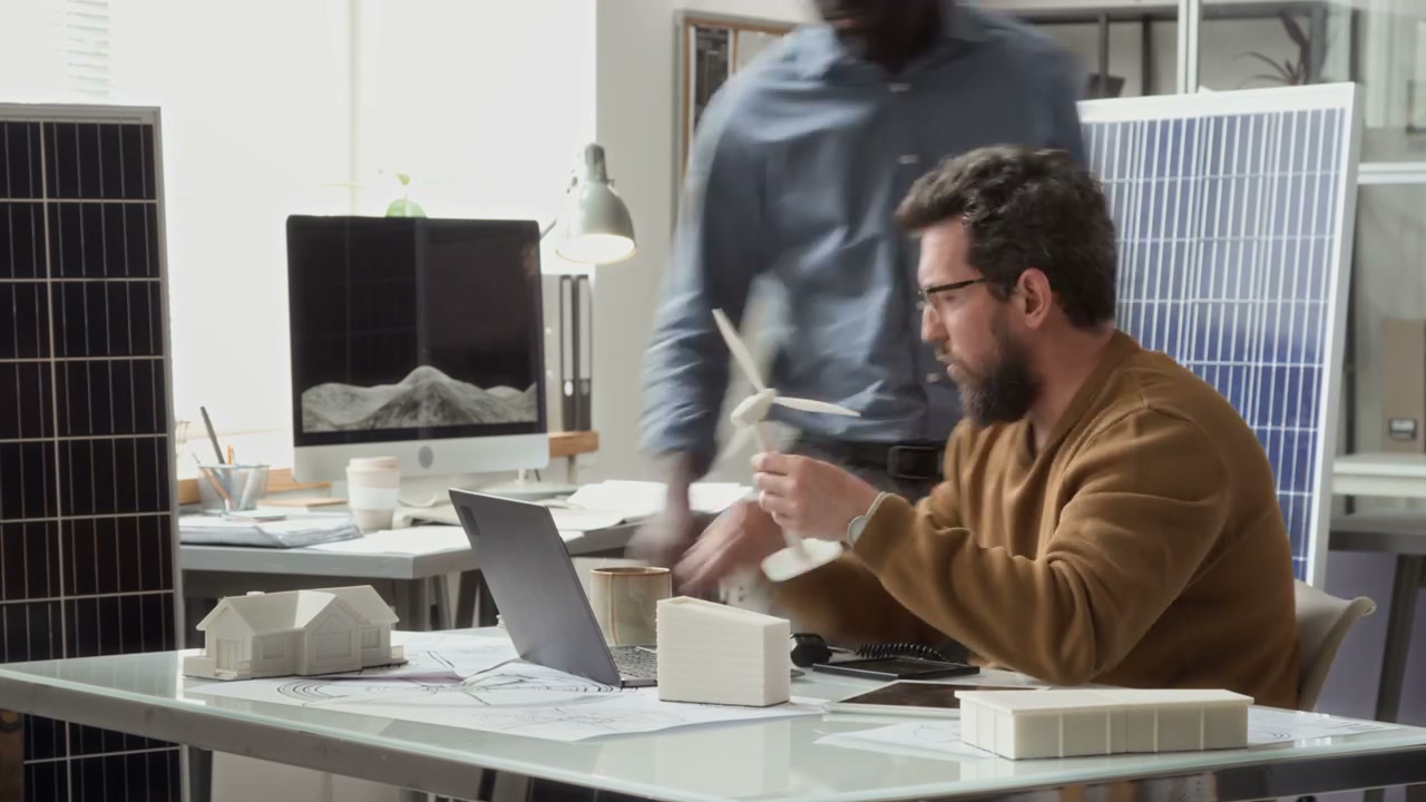 Engineers Working on Renewable Energy in Office Timelapse