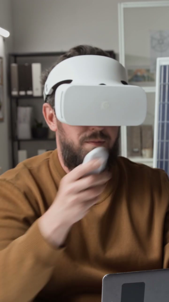 Engineer Using VR Headset in Studio Office