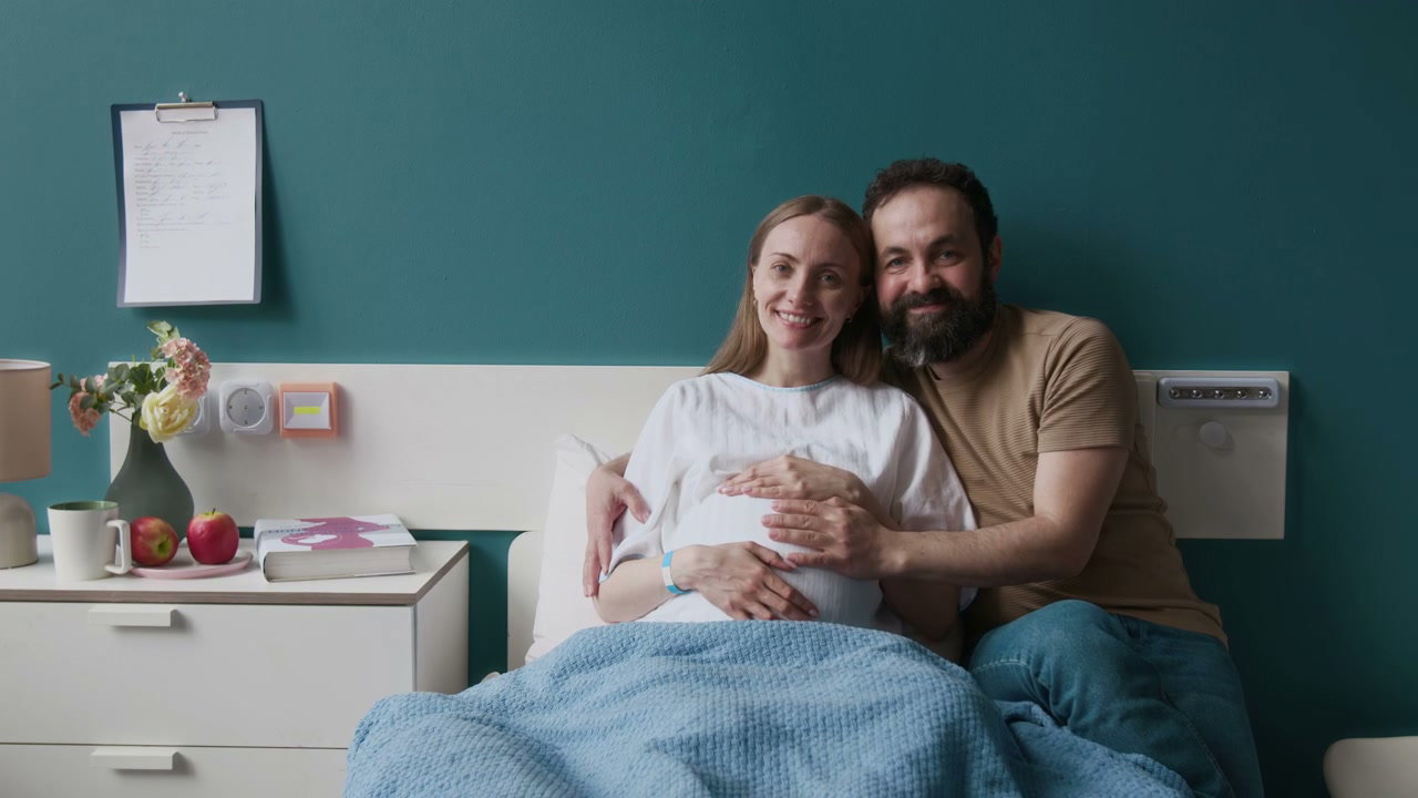 Expectant Parents in Hospital Room