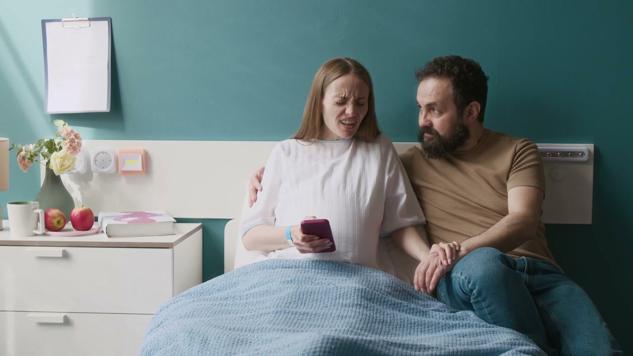 Pregnant Woman in Labor With Partner in Hospital