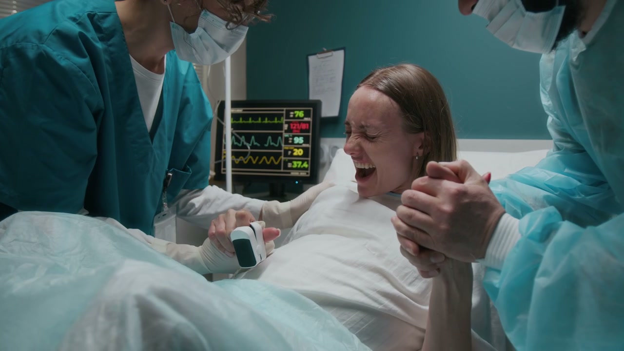 Woman in Labor with Healthcare Support
