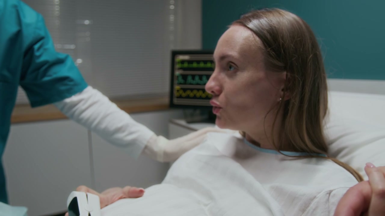 Pregnant Woman Breathing Through Contractions