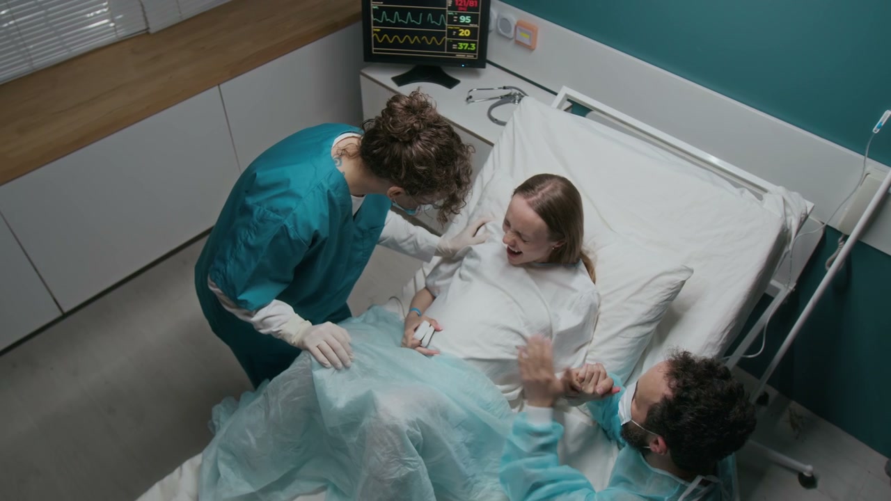Pregnant Woman Faints in Hospital Bed