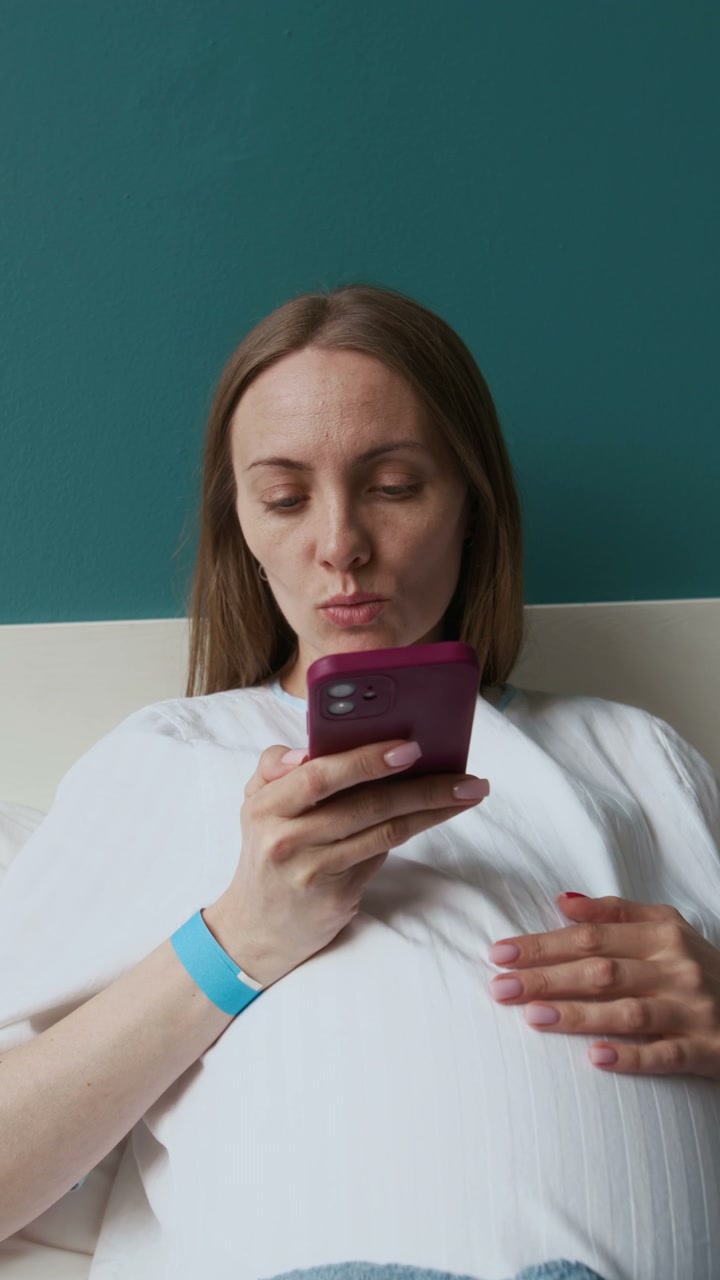 Pregnant Woman Sending Voice Message