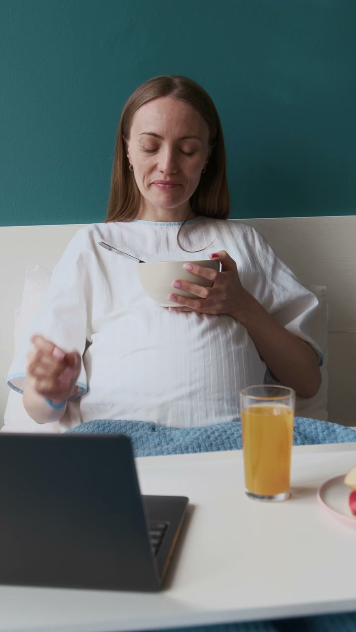 Pregnant Woman Having Breakfast in Hospital Bed