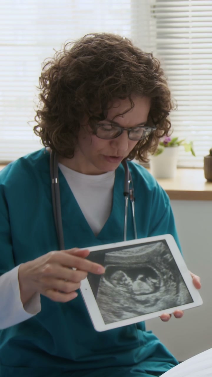 Doctor Shows Pregnancy Ultrasound on Tablet