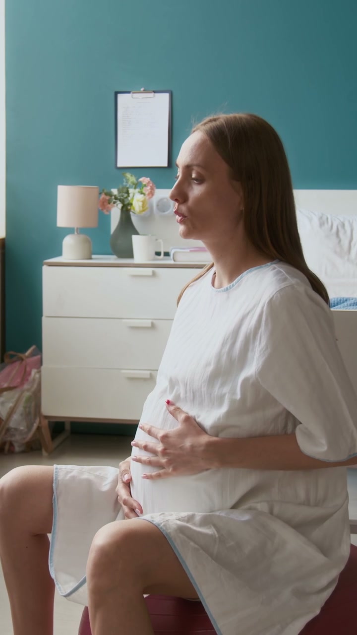 Pregnant Woman Breathing on Exercise Ball