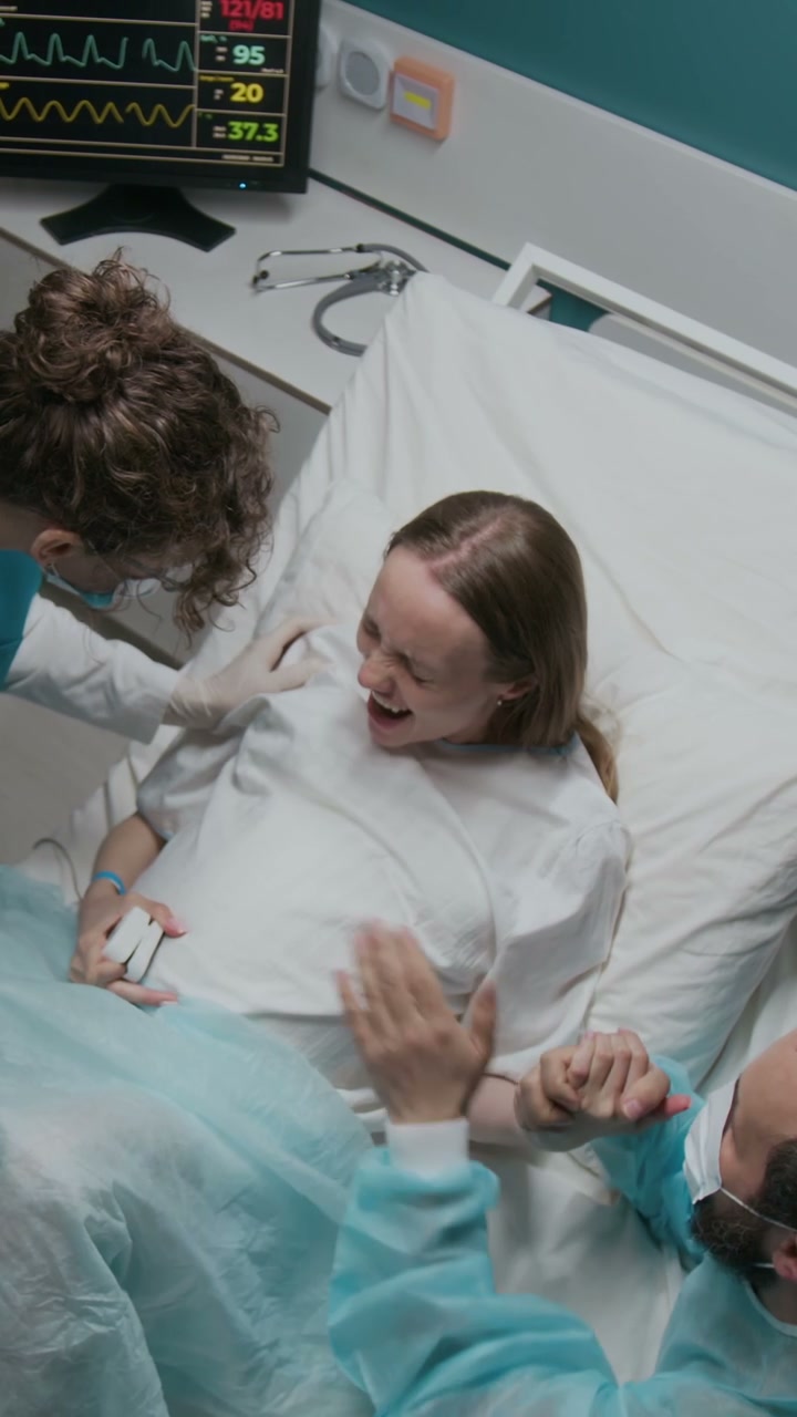 Pregnant Woman Faints, Receives Oxygen Mask