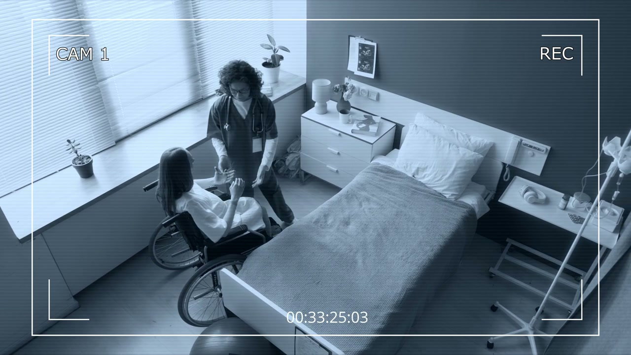 Nurse Helps Pregnant Woman to Hospital Bed