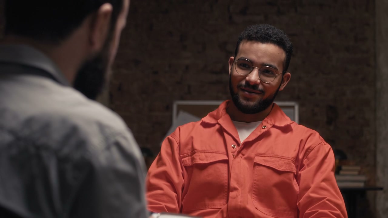 Inmate Discussing Rehabilitation with Therapist