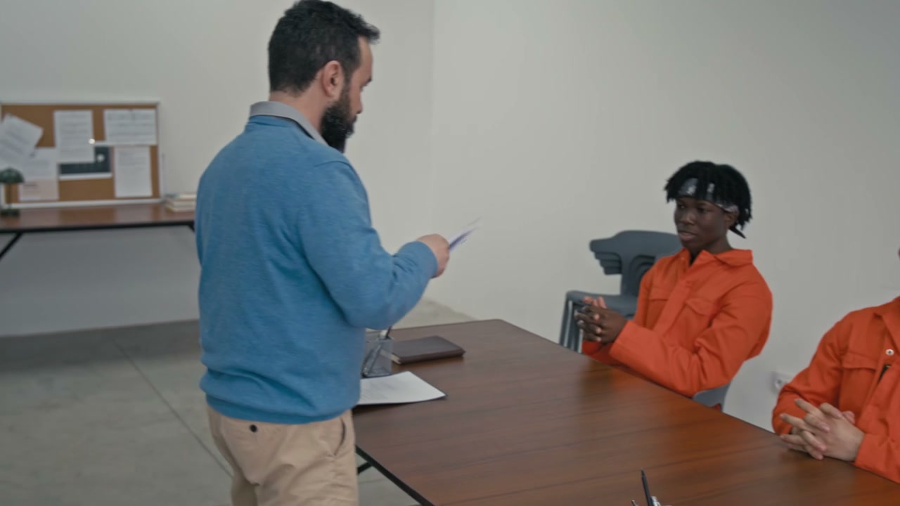 Teacher Leading Prison Education Class
