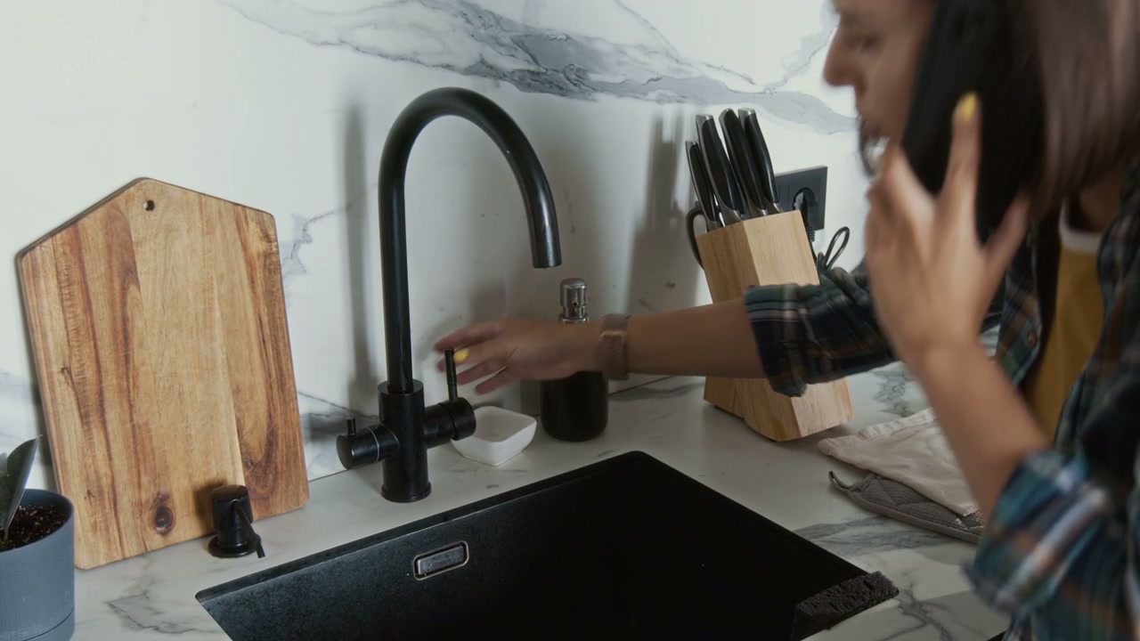 Woman Complaining About Broken Faucet