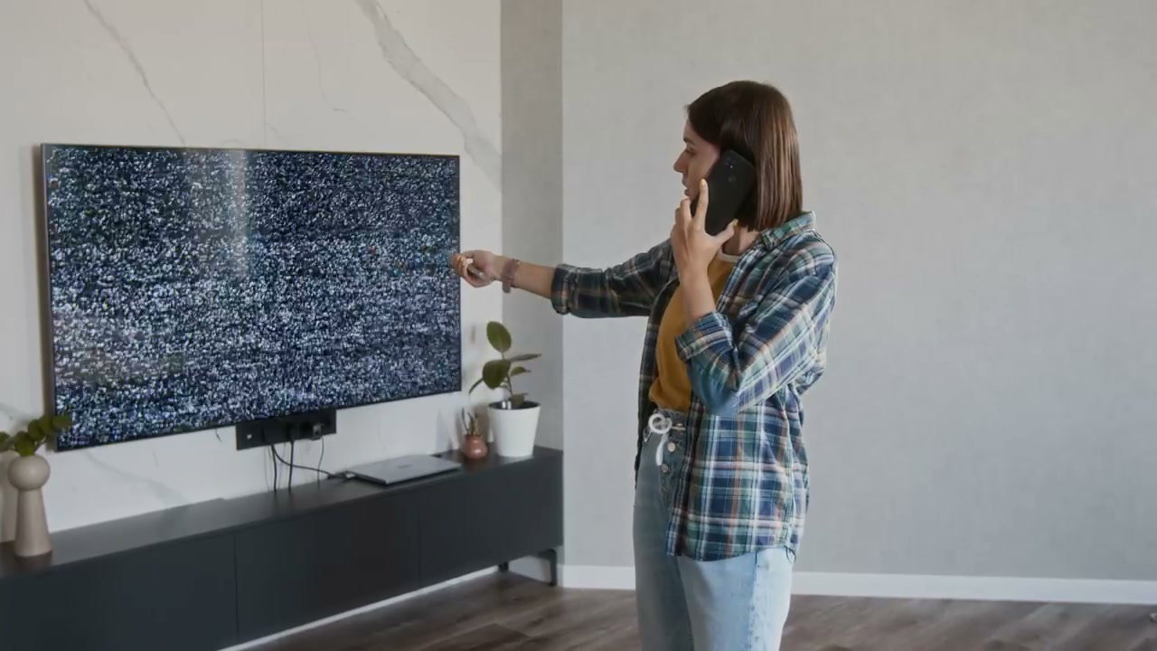 Woman Calls Support for TV Static Problem