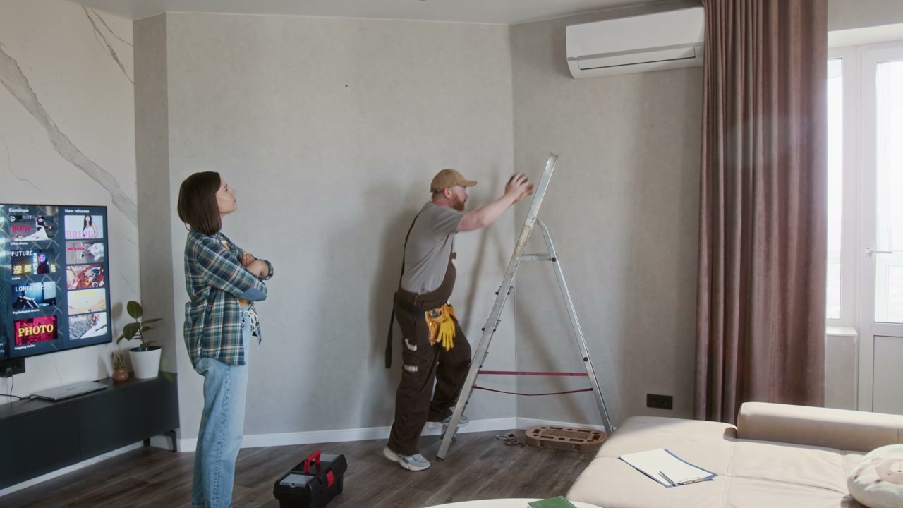 Technician Installing Smart Home Camera