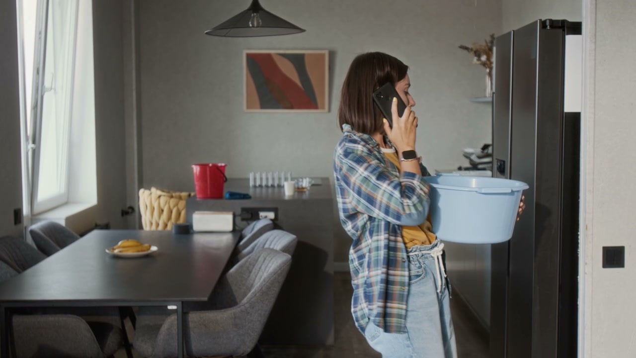 Woman Calls for Help with Leaking Ceiling