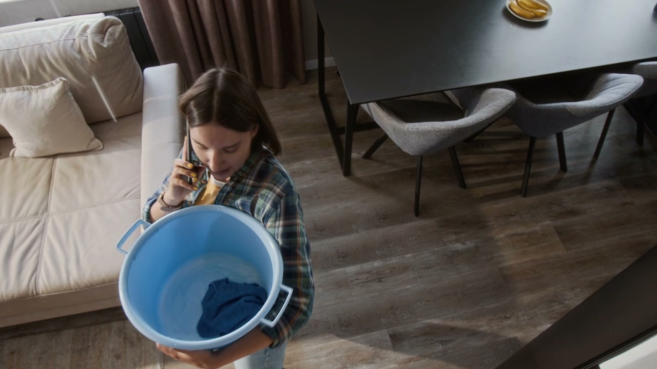 Woman Calling for Help During Ceiling Leak