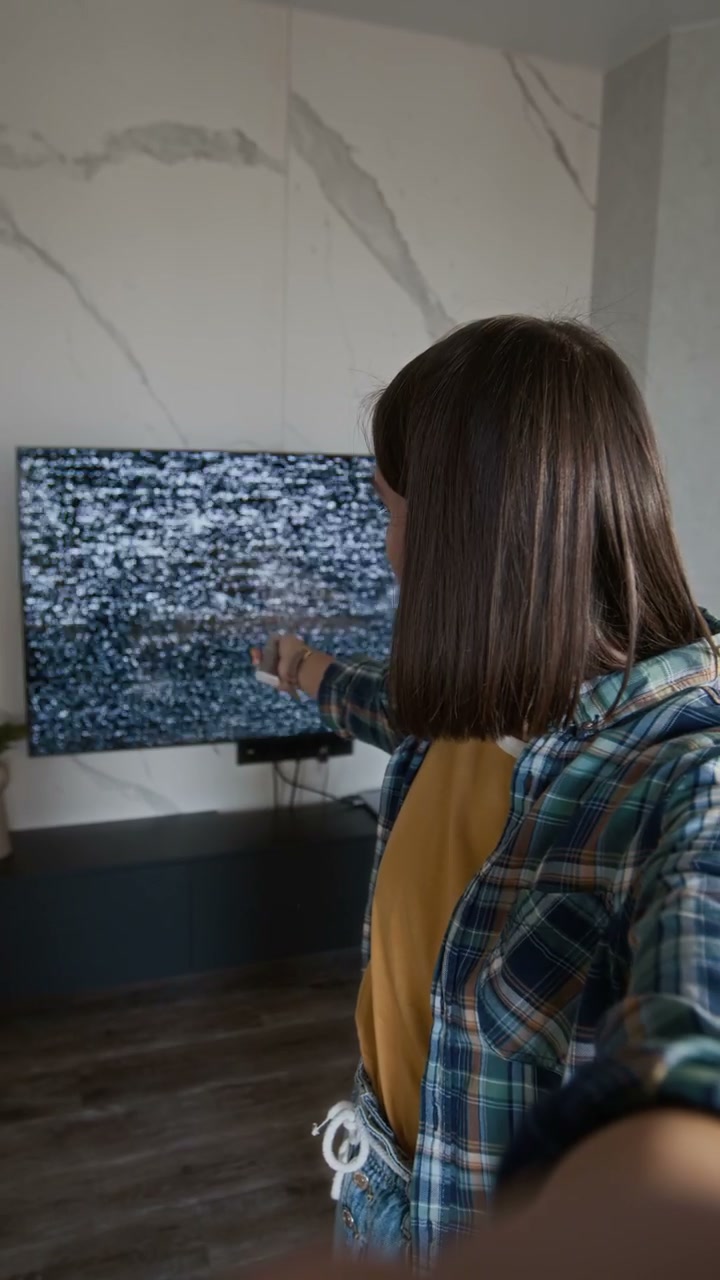 Woman Complaining About Static TV Screen