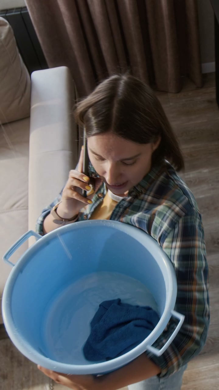 Woman Calling About Ceiling Leak in Apartment