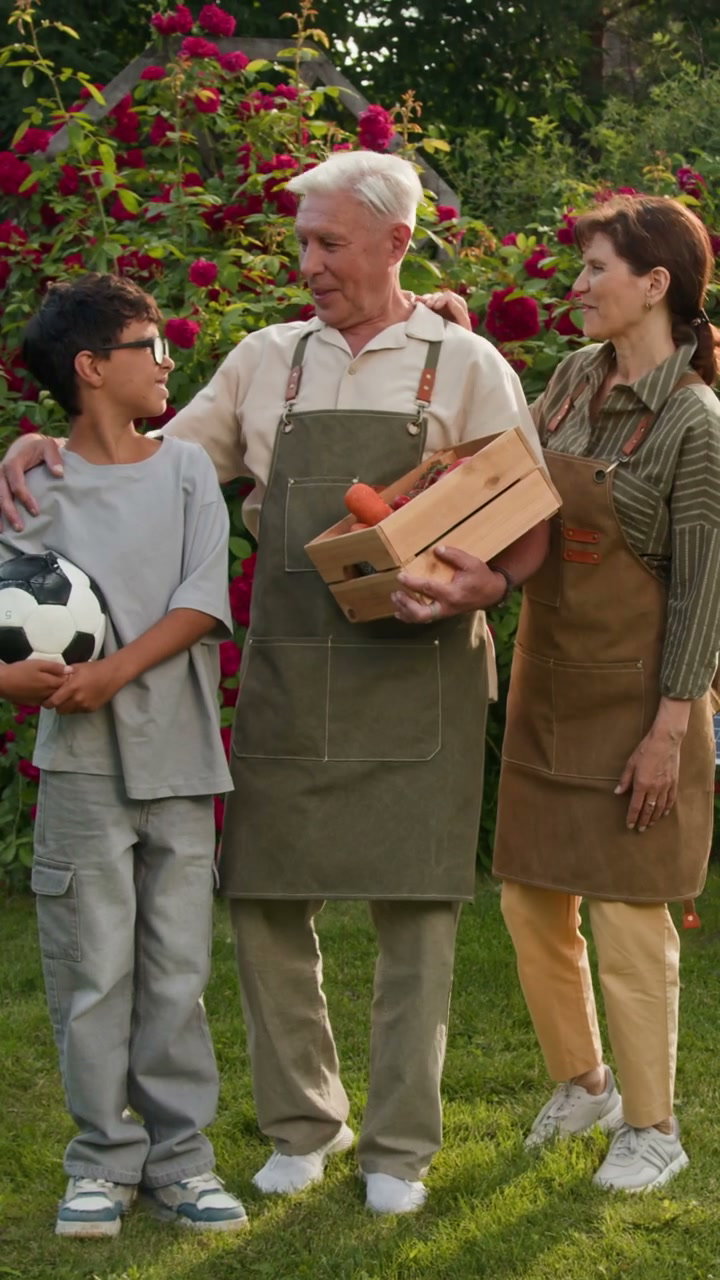 Family with Harvest and Solar Panel in Garden