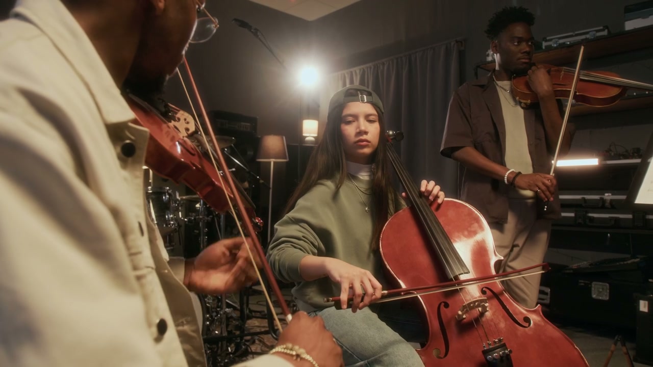 String Trio Rehearsing in Music Studio
