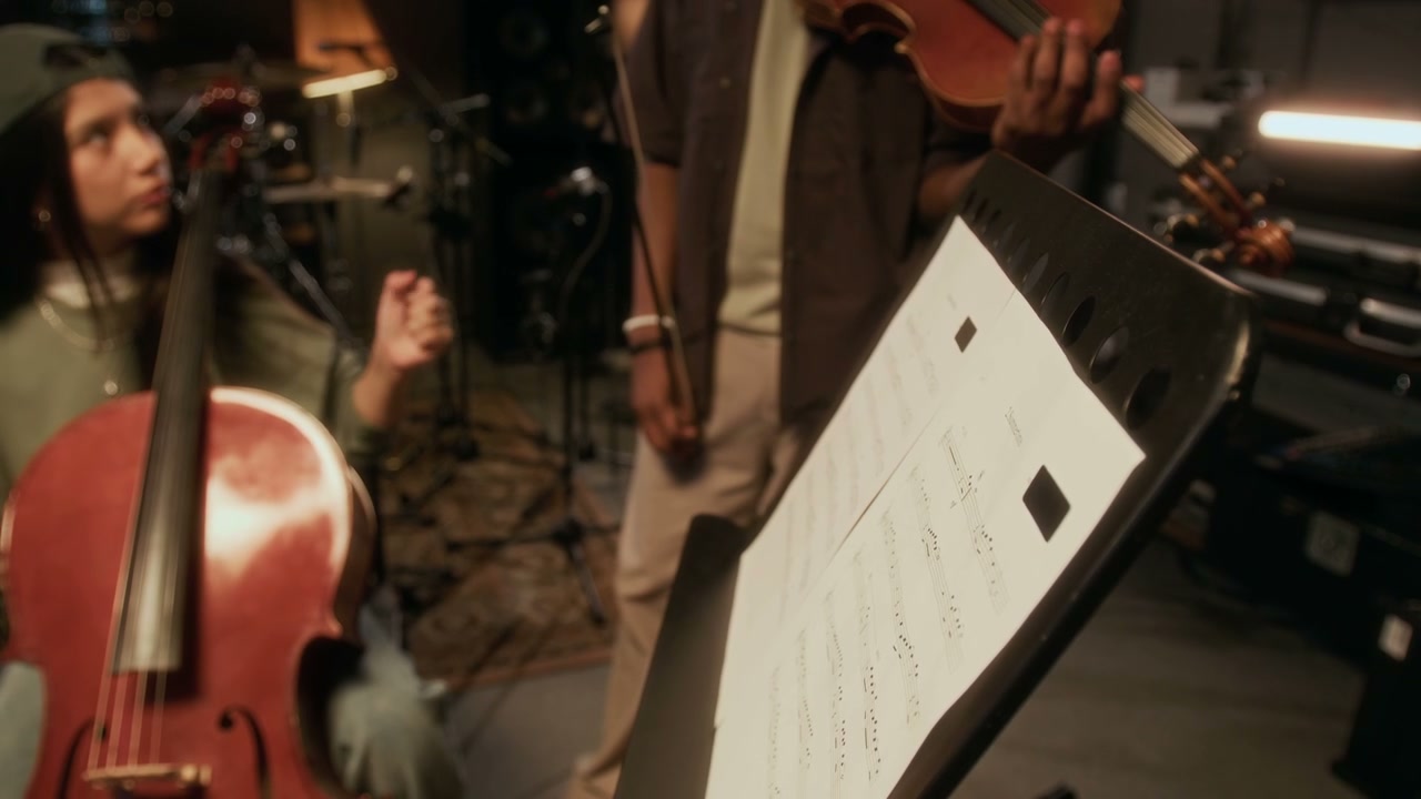 String Musicians Rehearsing in Studio