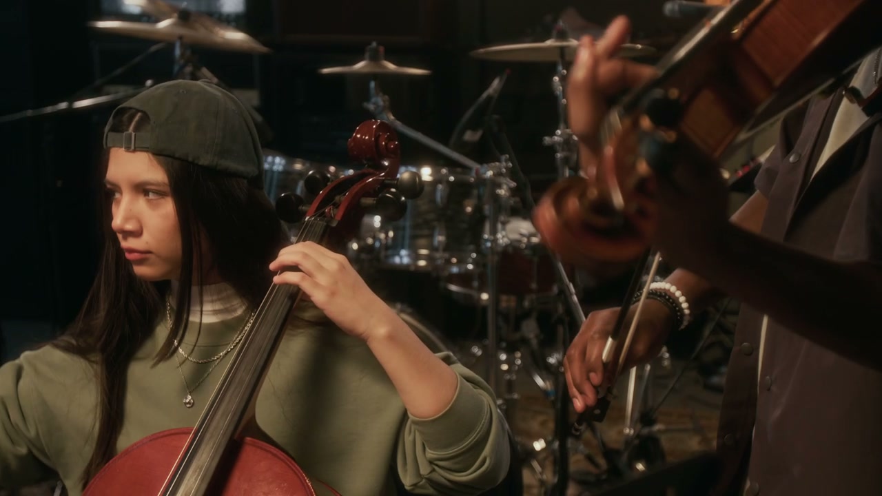 Man Playing Violin and Woman Playing Cello