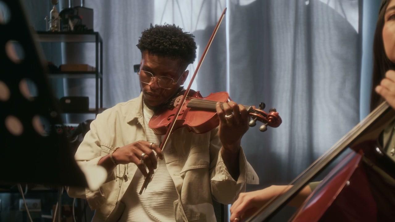 Musicians Playing Violin and Cello in Studio