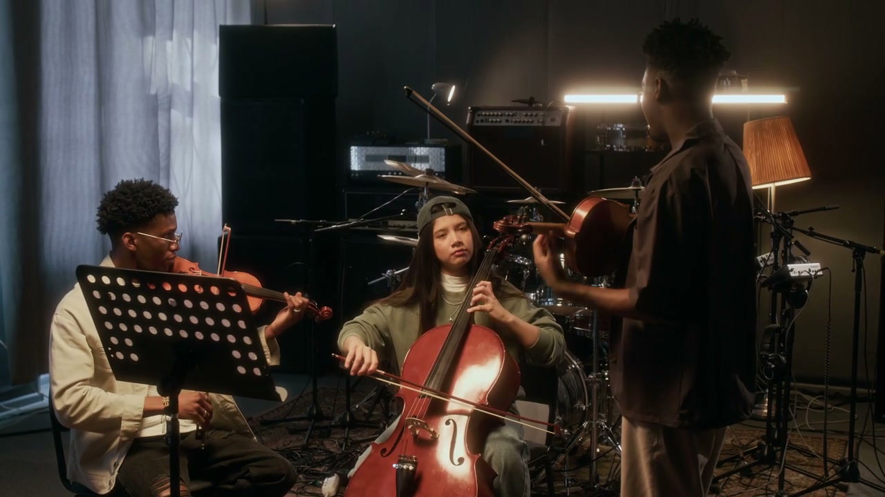 String Musicians Rehearsing in Music Studio