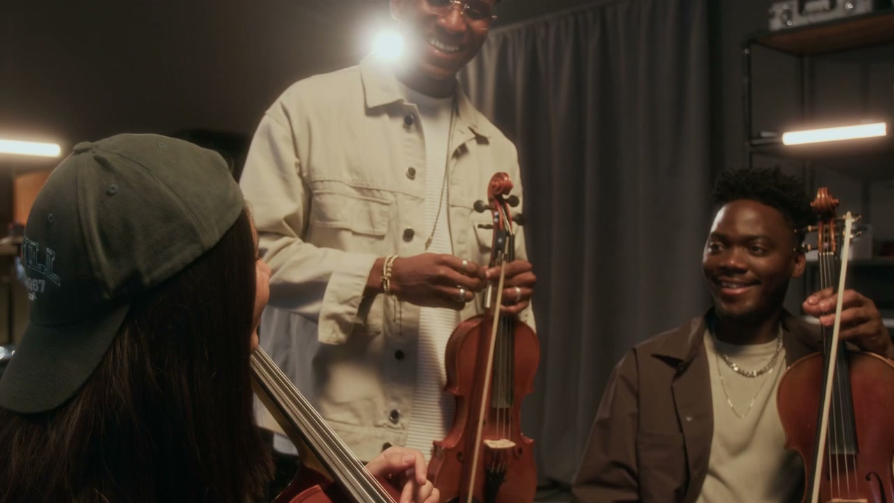 Diverse String Trio Talking in Studio