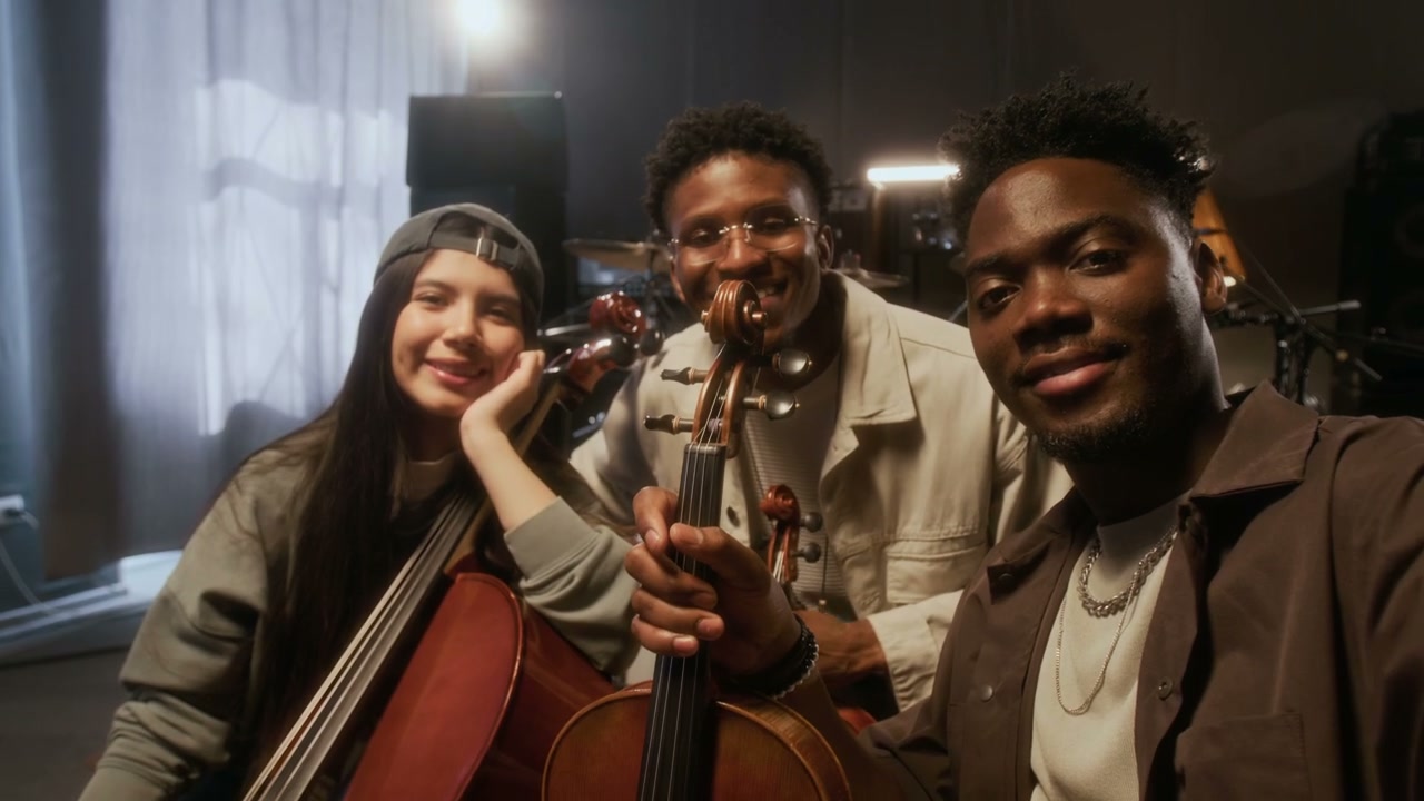 Happy Musicians Posing for Selfie in Studio