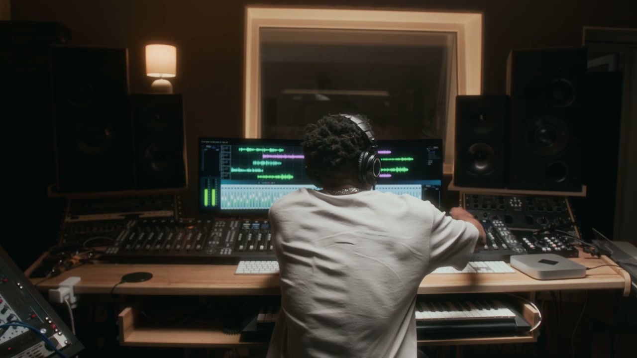 Music Producer Mixing Audio in Studio