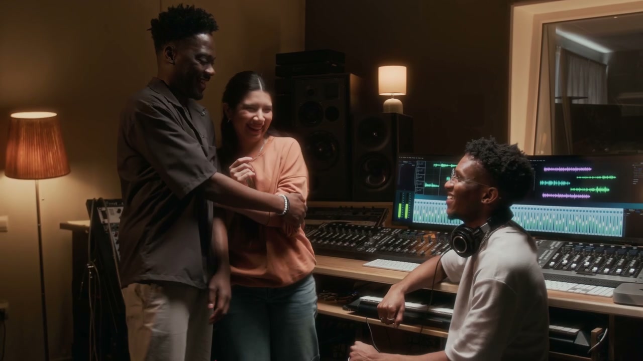 Music Producers Collaborating in Recording Studio