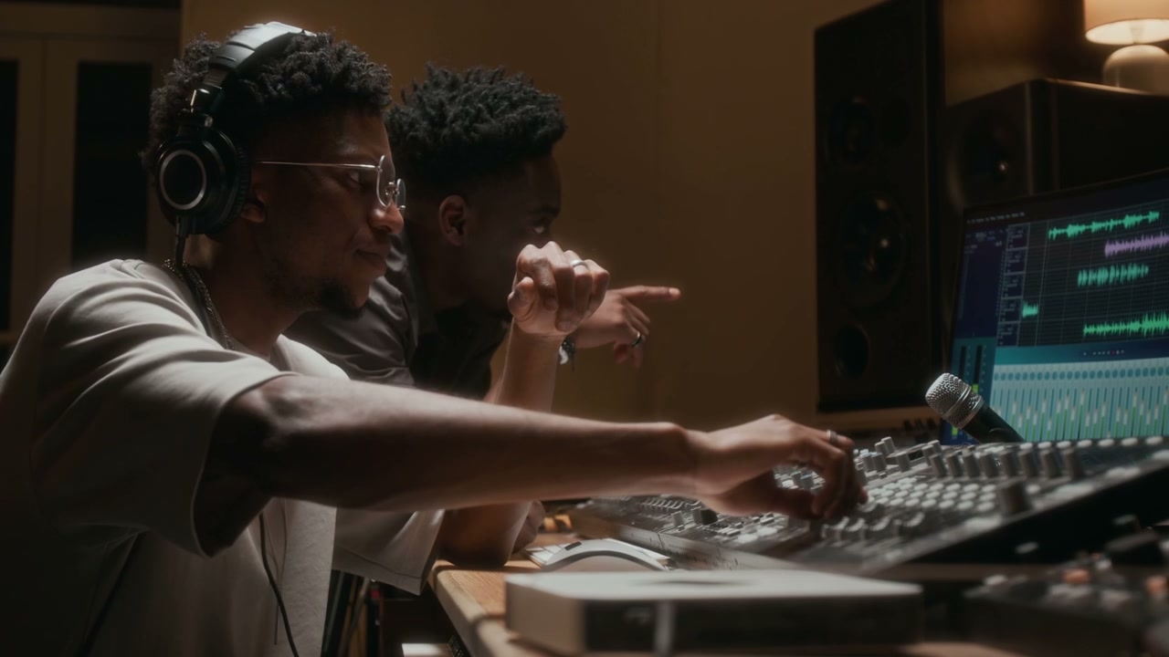 Sound Engineers Working in Music Studio