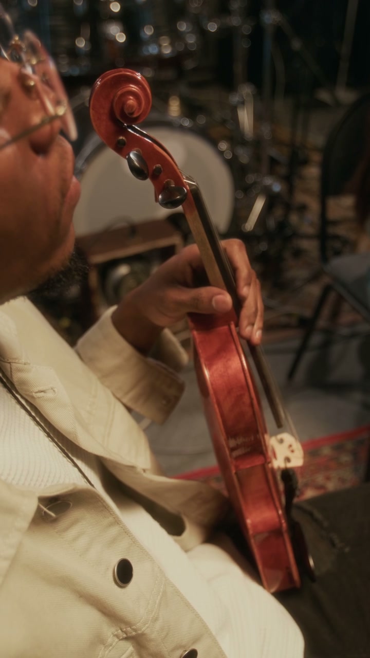 Musician Playing Violin in Recording Studio