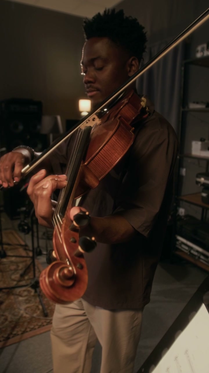 Man Playing Violin in Studio