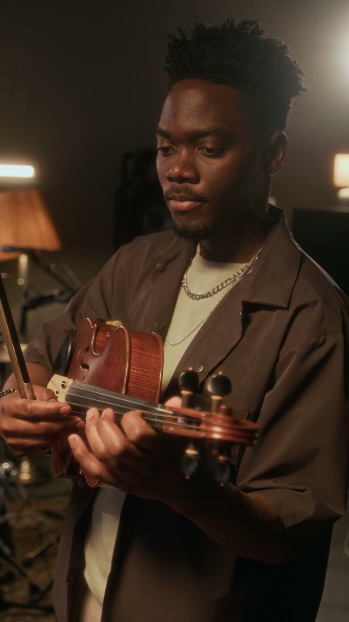 Musician Playing Violin in Studio