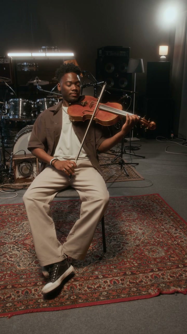Violinist Performing in a Recording Studio