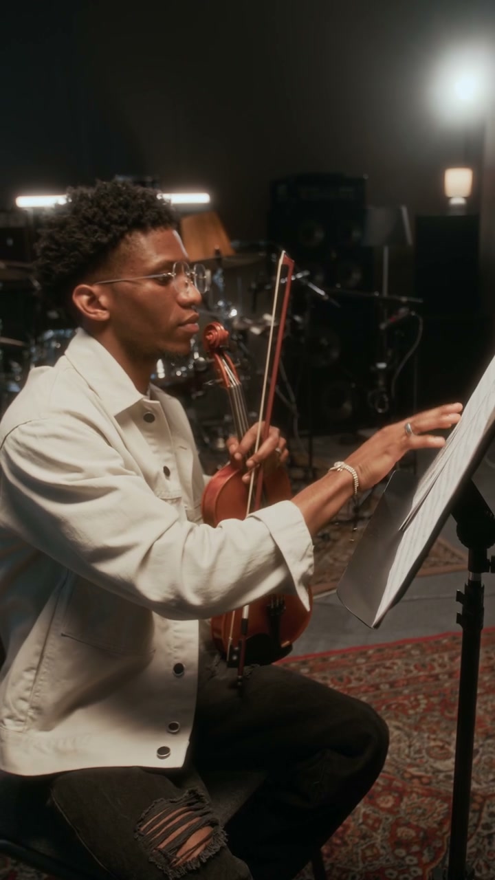 Musician Playing Violin in Recording Studio