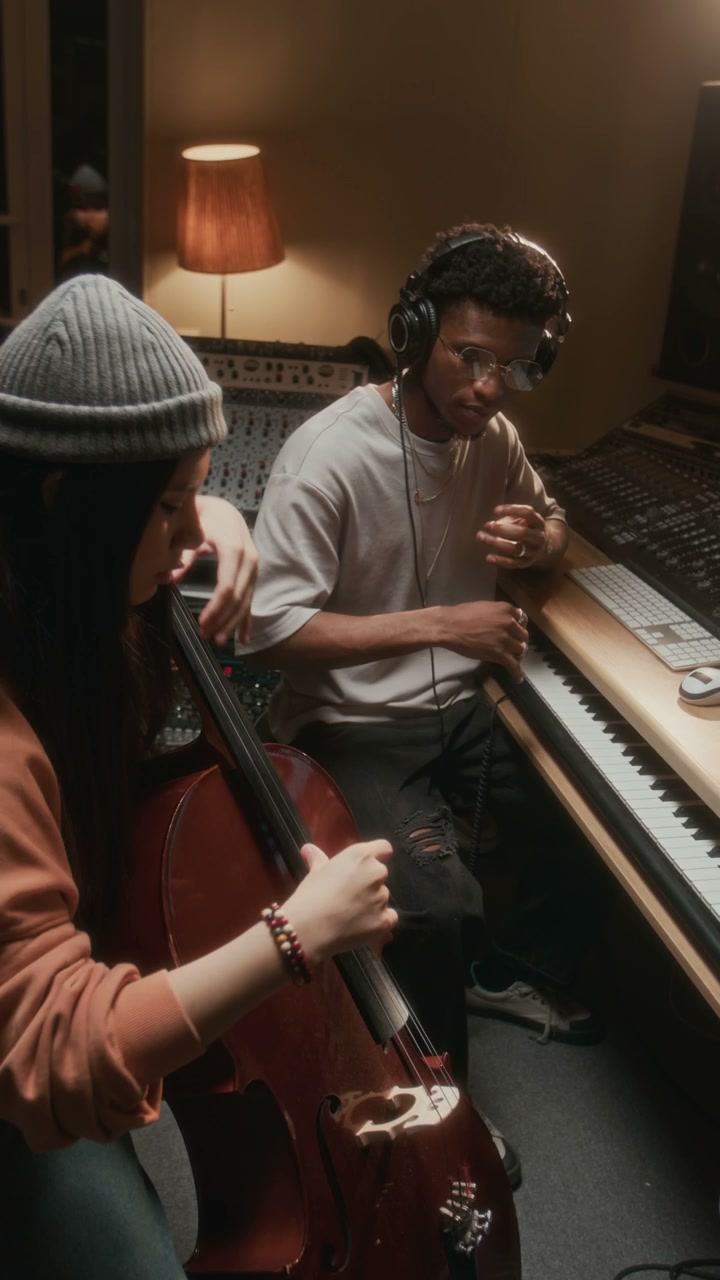 Cello Player and Producer in Music Studio
